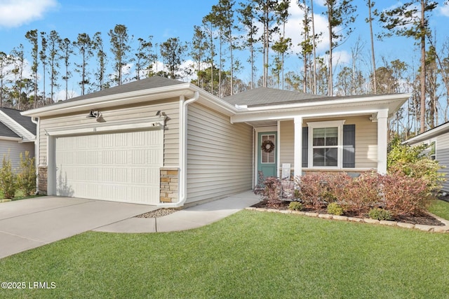 ranch-style house featuring a garage and a front yard