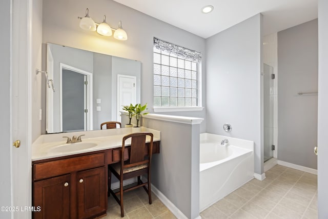 1470 Ashley Gardens Blvd, Charleston, SC 29414 - bathroom with a bath, a stall shower, vanity, and baseboards