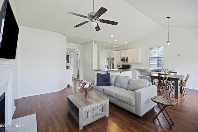 1470 Ashley Gardens Blvd, Charleston, SC 29414 - living area featuring a ceiling fan, dark wood-type flooring, lofted ceiling, recessed lighting, and a fireplace with flush hearth