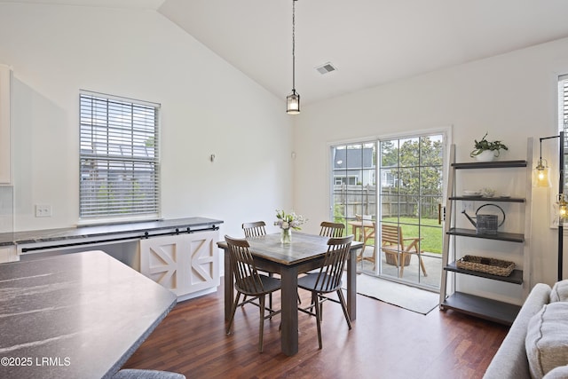 1470 Ashley Gardens Blvd, Charleston, SC 29414 - dining area with vaulted ceiling and dark wood-style floors