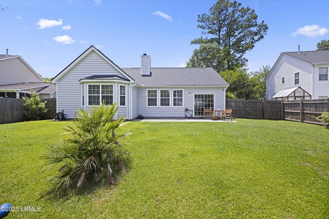 1470 Ashley Gardens Blvd, Charleston, SC 29414 - rear view of house with a chimney and a patio area