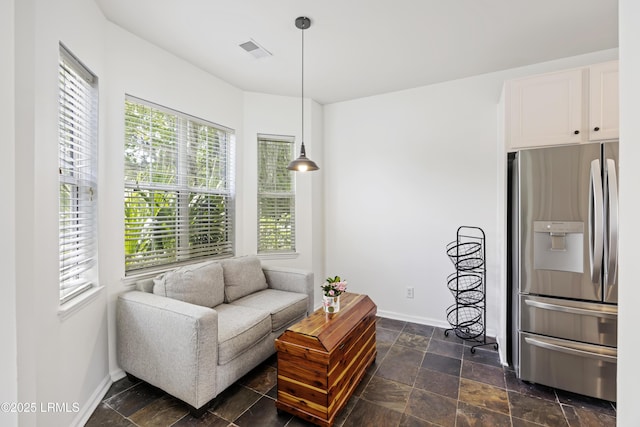 1470 Ashley Gardens Blvd, Charleston, SC 29414 - sitting room featuring baseboards and dark stone finish flooring