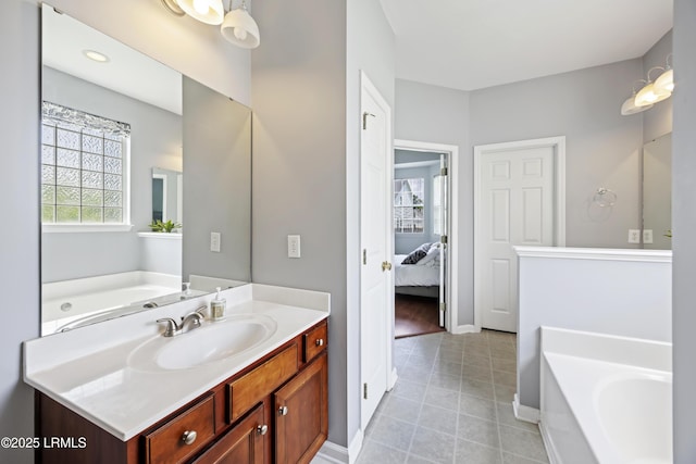 1470 Ashley Gardens Blvd, Charleston, SC 29414 - ensuite bathroom featuring a bath, tile patterned flooring, vanity, and baseboards