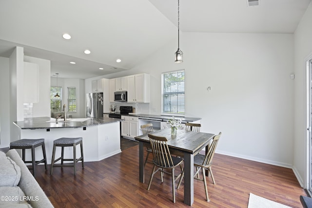 1470 Ashley Gardens Blvd, Charleston, SC 29414 - dining room with dark wood-style floors, recessed lighting, vaulted ceiling, and baseboards