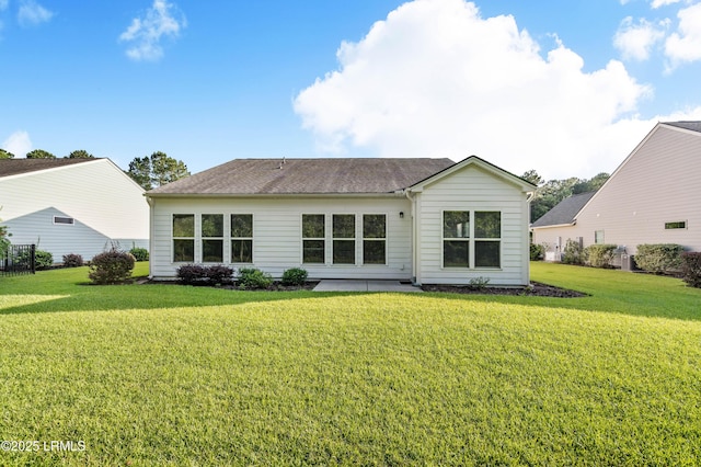 59 Gatewood Ln, Bluffton, SC 29910 - rear view of house with a lawn and a patio area