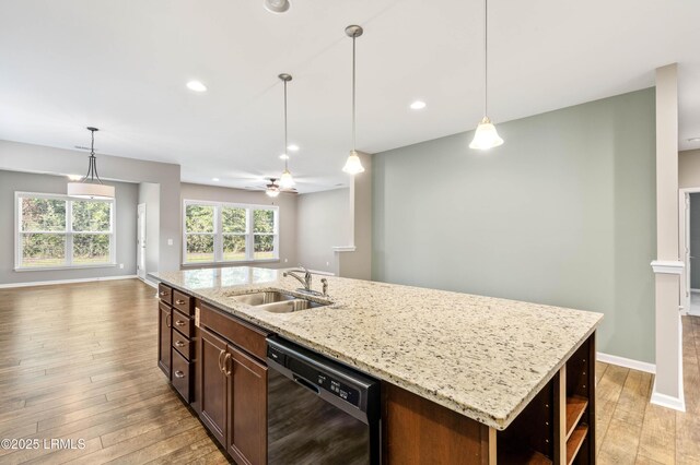 59 Gatewood Ln, Bluffton, SC 29910 - kitchen featuring wood-type flooring, a ceiling fan, recessed lighting, decorative light fixtures, and light stone counters