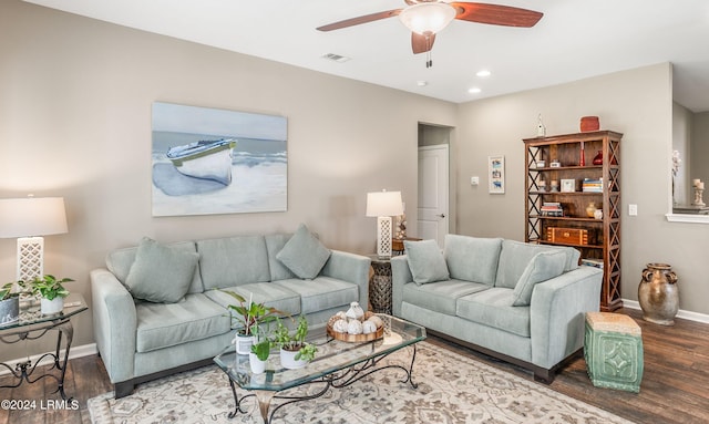 living room with ceiling fan and wood-type flooring