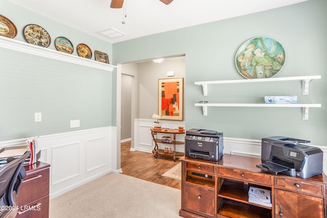 office area with ceiling fan and light colored carpet