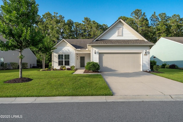 59 Gatewood Ln, Bluffton, SC 29910 - view of front of property with an attached garage, a front lawn, driveway, and a shingled roof