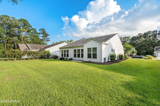 59 Gatewood Ln, Bluffton, SC 29910 - back of house featuring a lawn