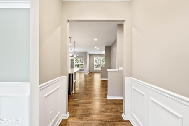 59 Gatewood Ln, Bluffton, SC 29910 - corridor with dark wood-style floors, recessed lighting, and wainscoting