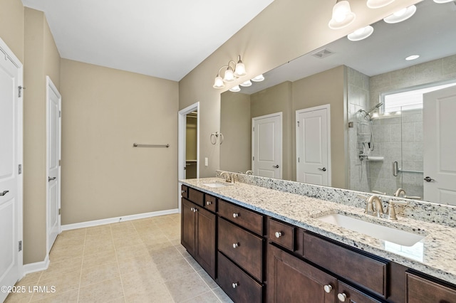 59 Gatewood Ln, Bluffton, SC 29910 - bathroom featuring double vanity, a shower stall, and tile patterned flooring