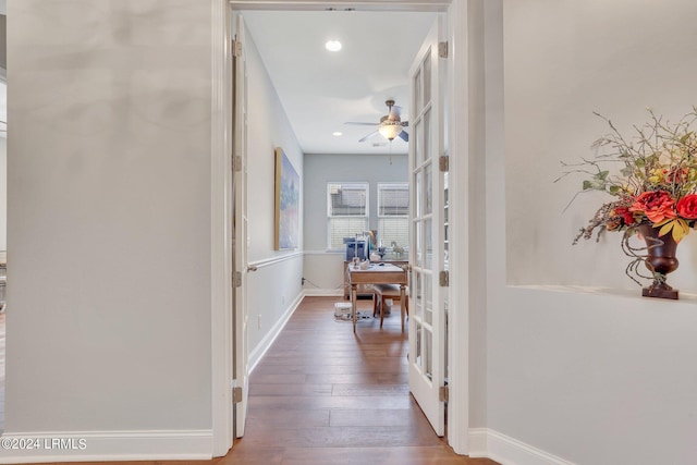 hallway featuring hardwood / wood-style floors