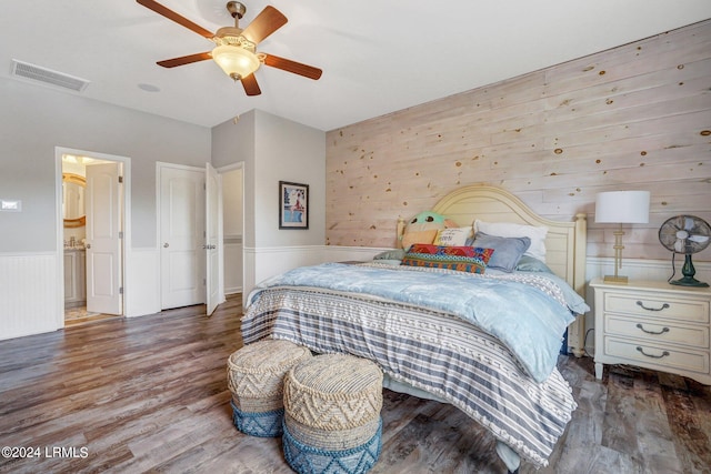 bedroom featuring dark hardwood / wood-style floors and ceiling fan