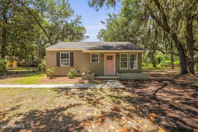1809 Battery Park Dr, Port Royal, SC 29935 - view of front of house featuring a front lawn and roof with shingles
