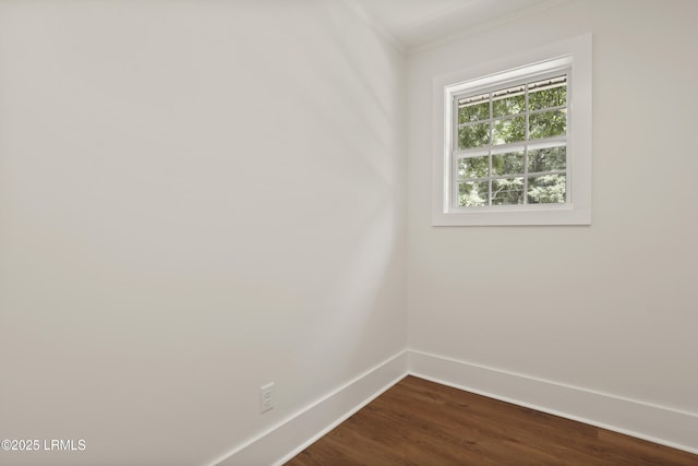 1809 Battery Park Dr, Port Royal, SC 29935 - spare room with baseboards, dark wood finished floors, and ornamental molding
