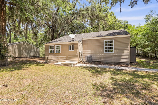 1809 Battery Park Dr, Port Royal, SC 29935 - back of property with a yard and cooling unit