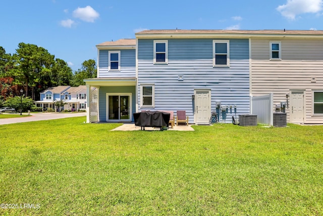 83 Plumgrass St, Bluffton, SC 29910 - rear view of property featuring a lawn