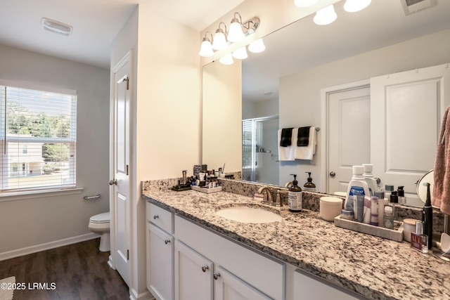 83 Plumgrass St, Bluffton, SC 29910 - bathroom with vanity, a stall shower, and wood finished floors