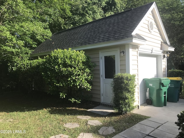 view of outbuilding featuring an outbuilding and a garage