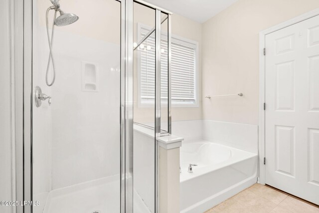 39 Woods Bay Rd, Bluffton, SC 29910 - bathroom with tile patterned flooring, a shower stall, and a bath