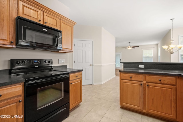 kitchen featuring ceiling fan with notable chandelier, dark countertops, black appliances, and light tile patterned flooring