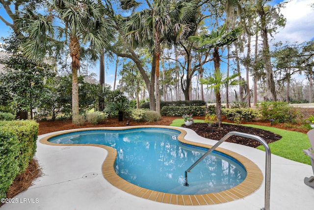 view of swimming pool with a fenced in pool and a patio