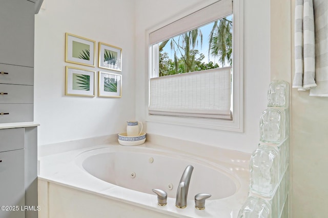 bathroom with a jetted tub