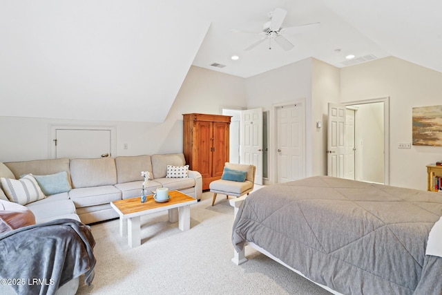 carpeted bedroom with vaulted ceiling, recessed lighting, visible vents, and a ceiling fan