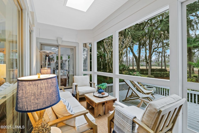 sunroom / solarium featuring a skylight