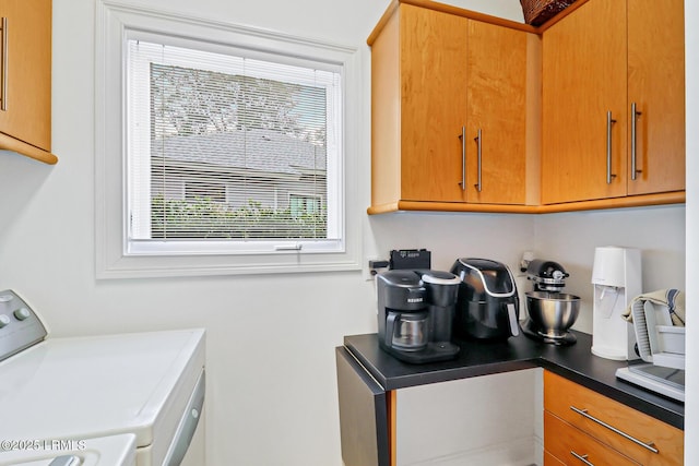 kitchen with dark countertops and brown cabinets