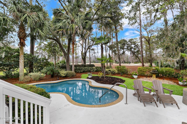 outdoor pool with a patio