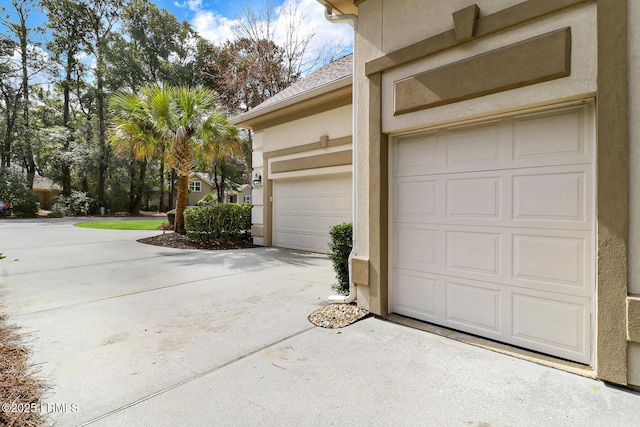 garage with driveway