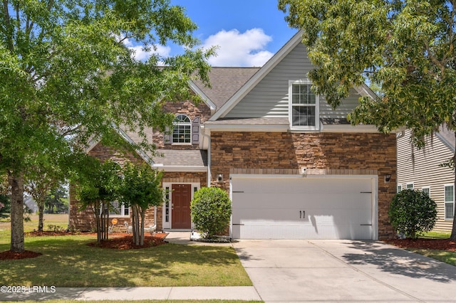 186 Pickett Mill Blvd, Okatie, SC 29909 - view of front of property with a front yard, a shingled roof, stone siding, and driveway
