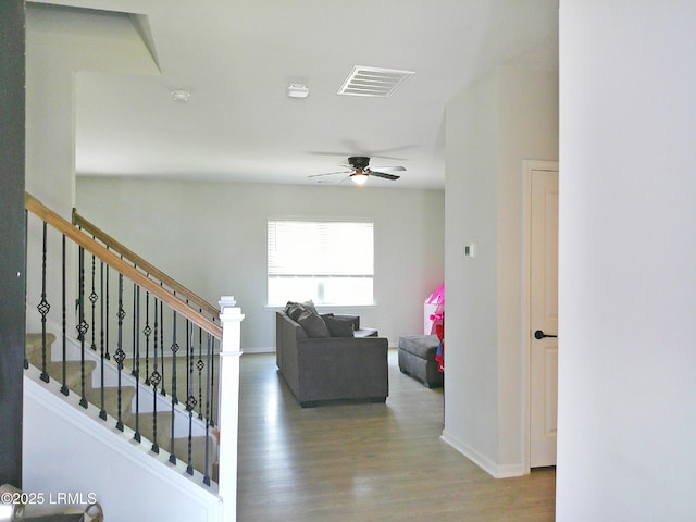 62 Keowee Ln, Beaufort, SC 29906 - staircase with ceiling fan and wood finished floors