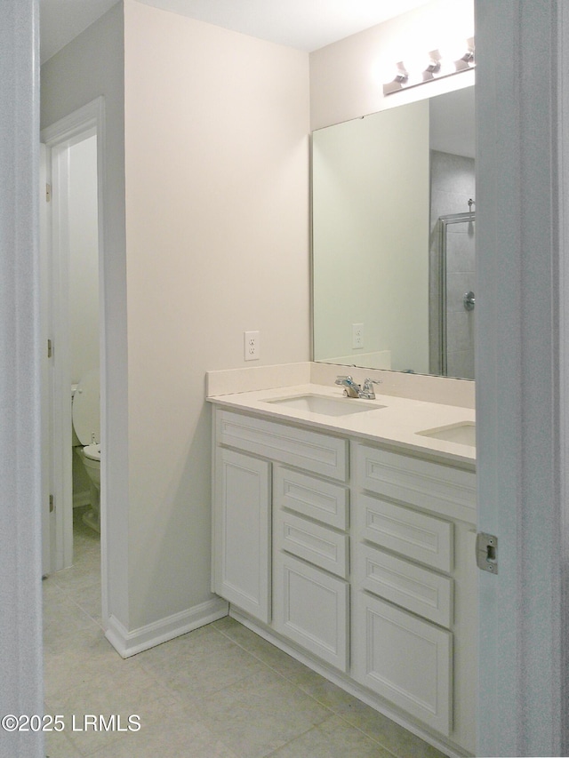 62 Keowee Ln, Beaufort, SC 29906 - bathroom with a stall shower, double vanity, and tile patterned floors