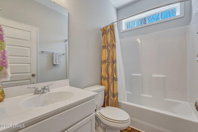 full bathroom featuring vanity, toilet, and shower / bath combo