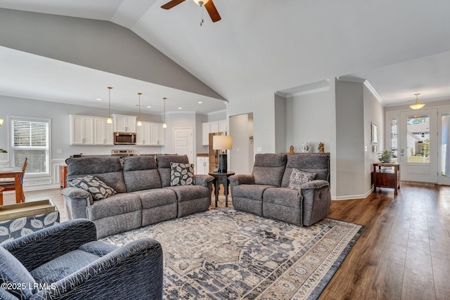 living room featuring crown molding, high vaulted ceiling, wood-type flooring, and ceiling fan