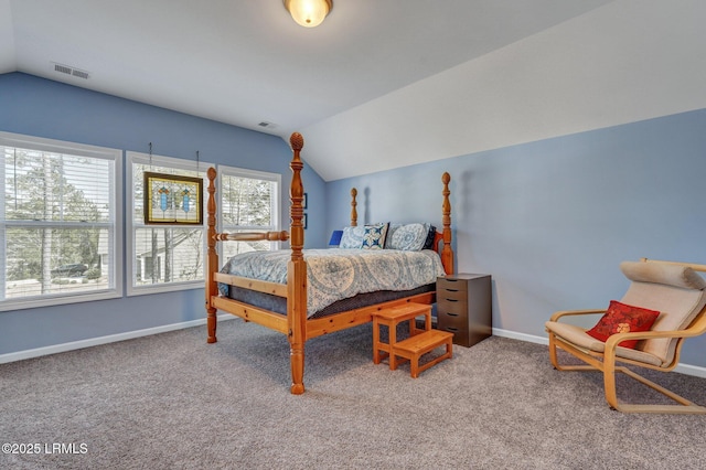 bedroom featuring vaulted ceiling, baseboards, visible vents, and carpet floors