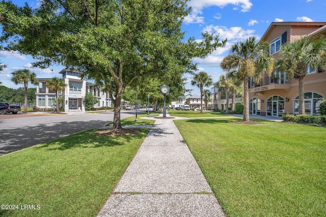 surrounding community featuring a lawn