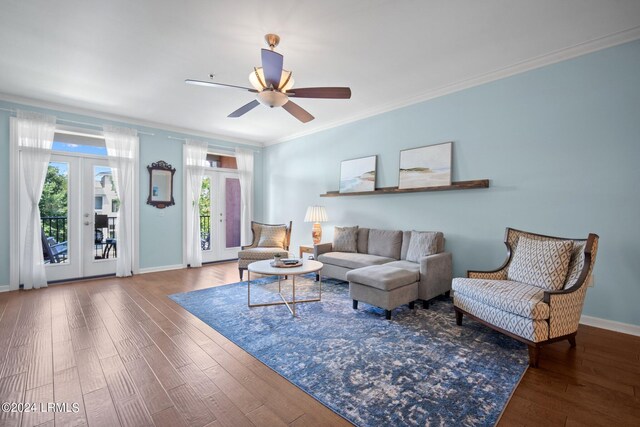 living room with hardwood / wood-style floors, crown molding, french doors, and ceiling fan