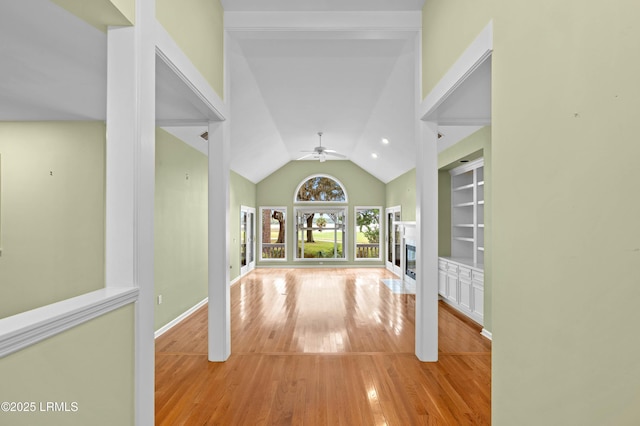 2 Doe Pt, Dataw Island, SC 29920 - hall featuring wood finished floors, vaulted ceiling, and built in shelves