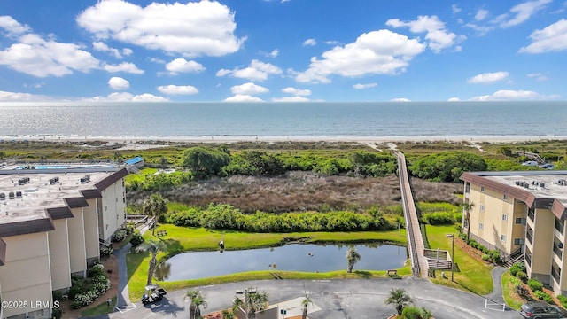 drone / aerial view with a water view