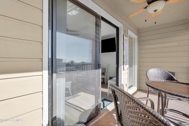 balcony featuring ceiling fan