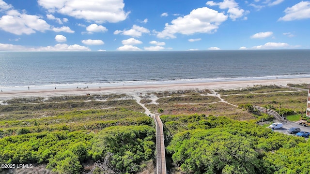 aerial view featuring a water view and a beach view