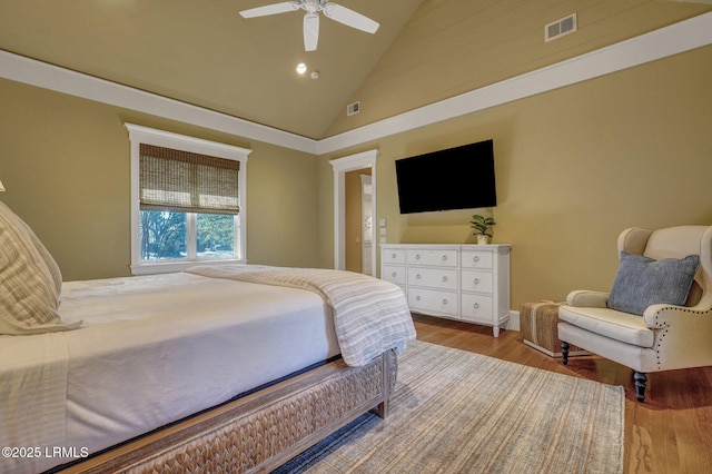 bedroom featuring ceiling fan, high vaulted ceiling, and light hardwood / wood-style floors