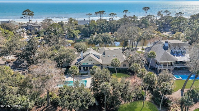 birds eye view of property featuring a water view