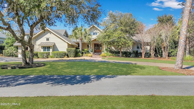 view of front facade with a front lawn