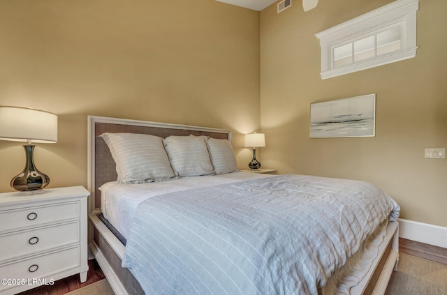 bedroom featuring hardwood / wood-style floors