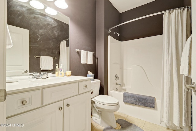 full bathroom featuring vanity, toilet, tile patterned flooring, and shower / bath combo with shower curtain